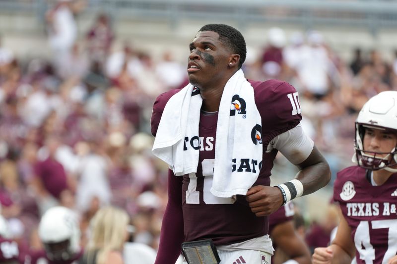 Sep 6, 2025; College Station, Texas, USA; Texas A&M Aggies quarterback Marcel Reed (10) running off the field after the second quarter ends against the Utah State Aggies at Kyle Field. Mandatory Credit: Sean Thomas-Imagn Images