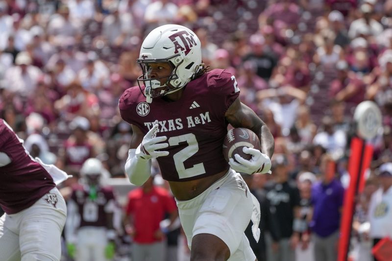 Sep 6, 2025; College Station, Texas, USA; Texas A&M Aggies wide receiver Terry Bussey (2) runs with the football during the second half against the Utah State Aggies at Kyle Field. Mandatory Credit: Sean Thomas-Imagn Images