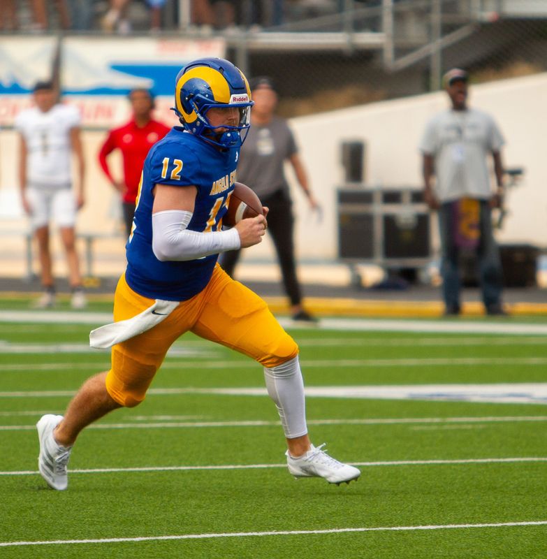Angelo State football's Braeden Fuller (12) runs the ball against Emporia State at LeGrand Stadium at 1st Community Credit Union Field on Saturday, Sept. 6, 2025.