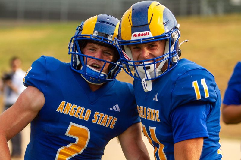 Angelo State football's Hunter Wallis (2) and Ayden Arp (11) celebrate after a touchdown against Emporia State at LeGrand Stadium at 1st Community Credit Union Field on Saturday, Sept. 6, 2025.