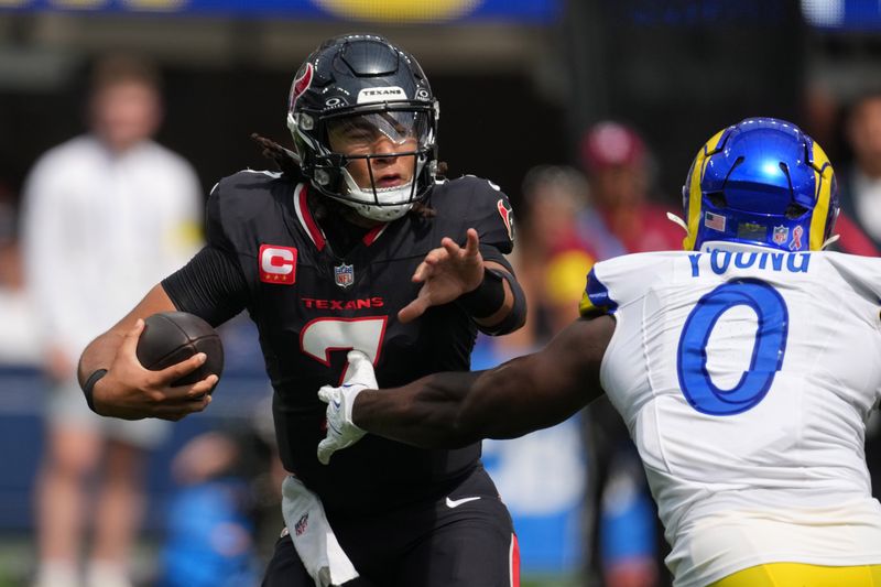 Sep 7, 2025; Inglewood, California, USA; Houston Texans quarterback C.J. Stroud (7) during the game against the Los Angeles Rams at SoFi Stadium. Mandatory Credit: Kirby Lee-Imagn Images