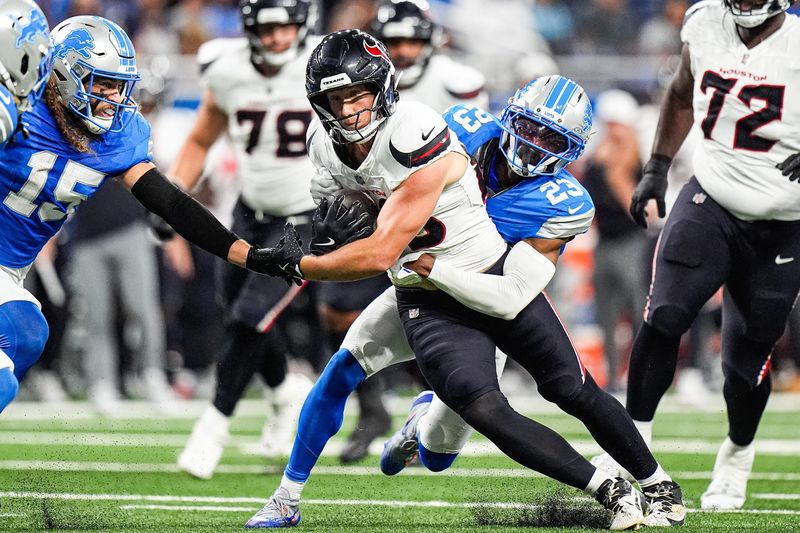 Detroit Lions cornerback Rock Ya-Sin (23) tackles Houston Texans tight end Harrison Bryant (88) during the first half at Ford Field in Detroit on Saturday, August 23, 2025.