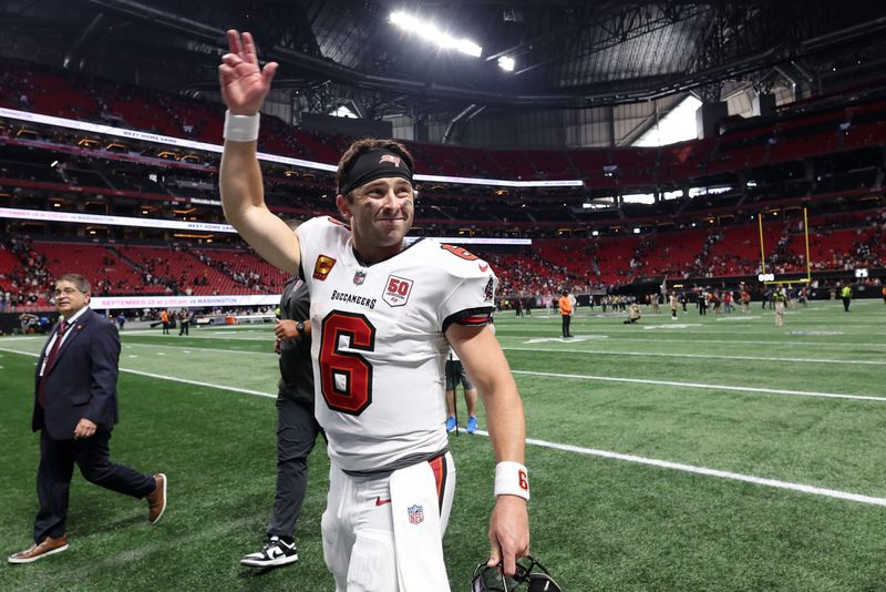 Sep 7, 2025; Atlanta, Georgia, USA; Tampa Bay Buccaneers quarterback Baker Mayfield (6) waves to fans after their win against the Atlanta Falcons at Mercedes-Benz Stadium. Mandatory Credit: Brett Davis-Imagn Images