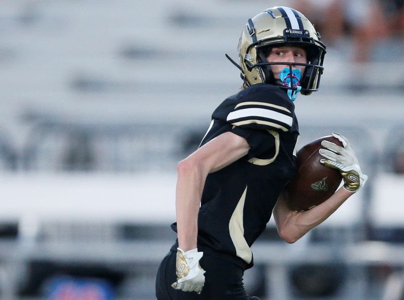 Lubbock High's Easton Blakely runs after a catch against Snyder in a non-district football game Thursday, Sept. 11, 2025, at Lowrey Field.