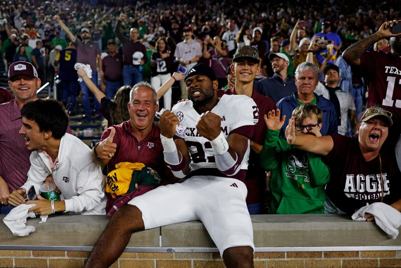 Sep 13, 2025; South Bend, Indiana, USA; Texas A&M Aggies running back Jamarion Morrow (23) celebrates after their win against the Notre Dame Fighting Irish at Notre Dame Stadium. Mandatory Credit: Michael Caterina-Imagn Images