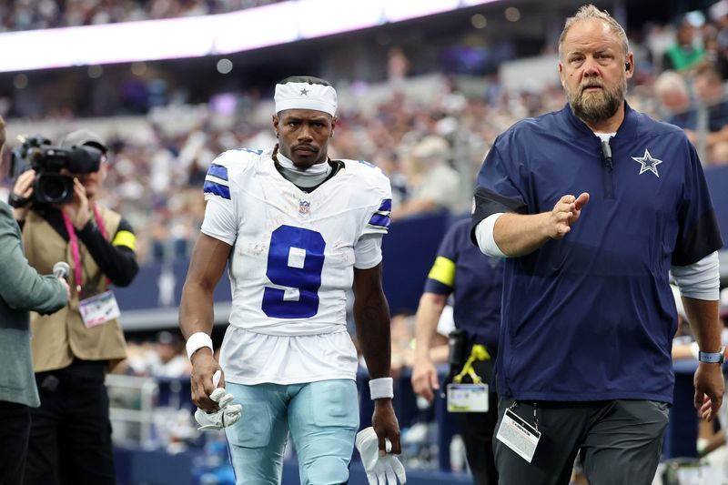 Sep 14, 2025; Arlington, Texas, USA; Dallas Cowboys wide receiver KaVontae Turpin (9) heads to the locker room during the third quarter at AT&T Stadium. Mandatory Credit: Kevin Jairaj-Imagn Images