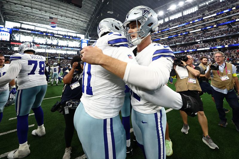 Sep 14, 2025; Arlington, Texas, USA; Dallas Cowboys place kicker Brandon Aubrey (17) with offensive tackle Nate Thomas (71) after the game against the New York Giants at AT&T Stadium. Mandatory Credit: Kevin Jairaj-Imagn Images