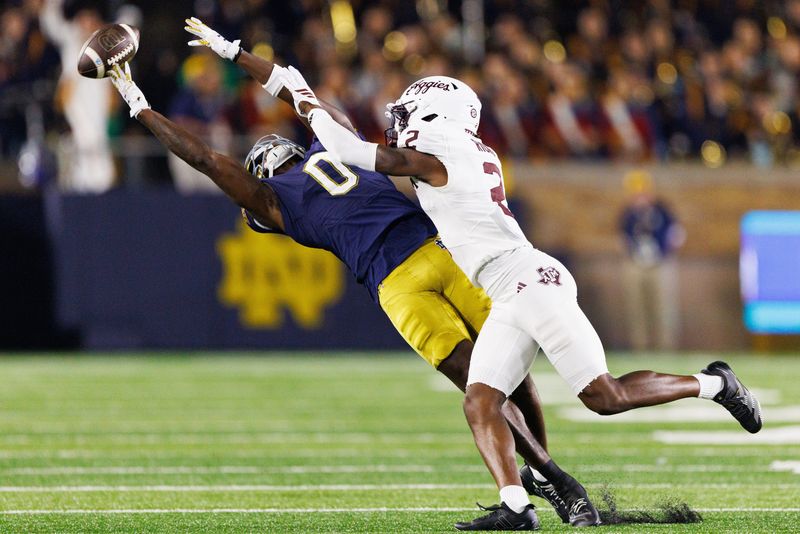 A pass intended for Notre Dame wide receiver Malachi Fields (0) flies past with Texas A&M cornerback Dezz Ricks (2) defending in the second half of a NCAA football game at Notre Dame Stadium on Saturday, Sept. 13, 2025, in South Bend.