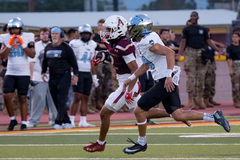 Andress’ Emilio Burciaga (2) runs the ball during a District 1-5A football game against Chapin at Andress High in El Paso, Texas, on Friday, Sept. 19, 2025.