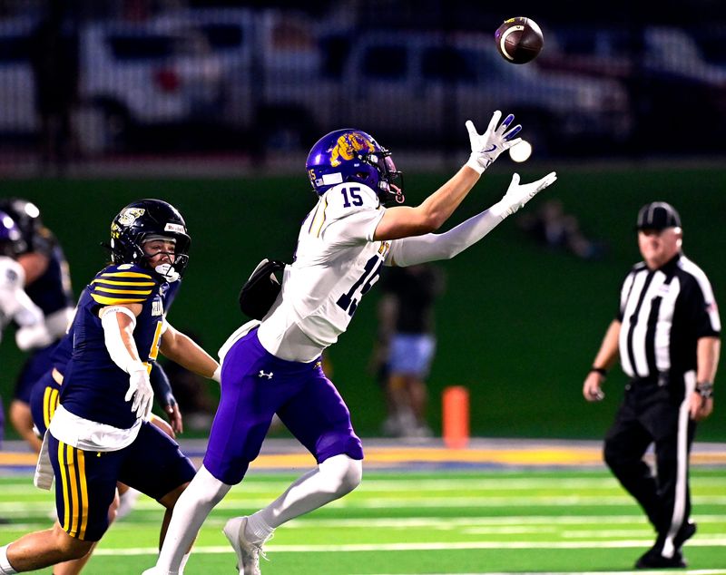 Wylie wide receiver Blaze Ruffin reaches for an overthrown pass as Stephenville’s Cooper Fergason closes behind him during Friday’s game at Art Briles Stadium in Stephenville Sept. 19, 2025. Final score was 52-13, Stephenville.