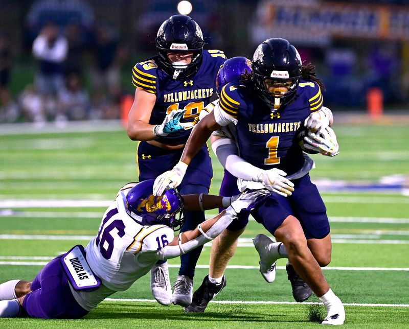 Wylie strong safety Carter Nelson tries to pull down Stephenville’s Zyler McClendon during Friday’s game at Art Briles Stadium in Stephenville Sept. 19, 2025. Final score was 52-13, Stephenville.