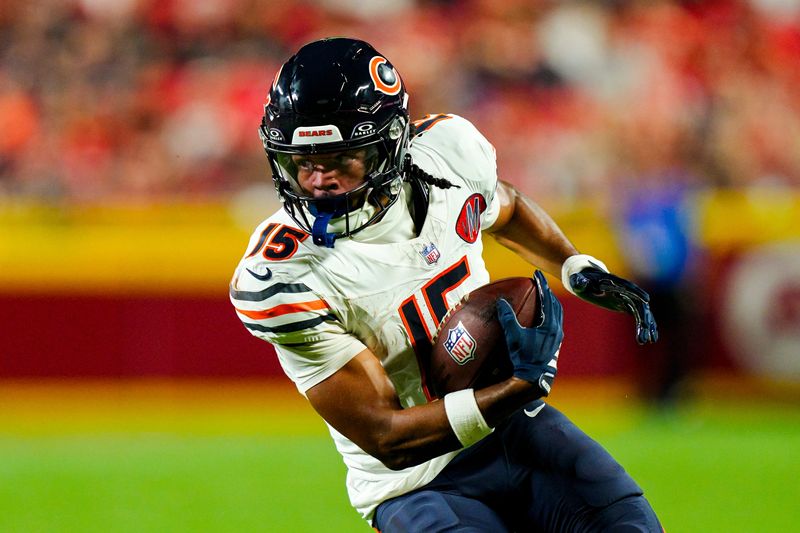 Aug 22, 2025; Kansas City, Missouri, USA; Chicago Bears wide receiver Rome Odunze (15) runs with the ball during the first half against the Kansas City Chiefs at GEHA Field at Arrowhead Stadium. Mandatory Credit: Jay Biggerstaff-Imagn Images