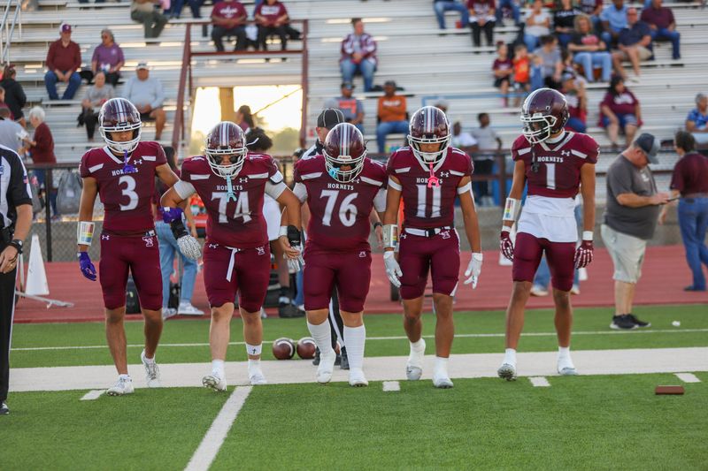 From left to right: Tulia captains Aiden Marquez, Ryan Ramirez, Zach Trevino, Gustavo Trevino and Logan Becerra walk onto the field before a non-district football game against West Texas at Younger Field on Sept. 18, 2025.