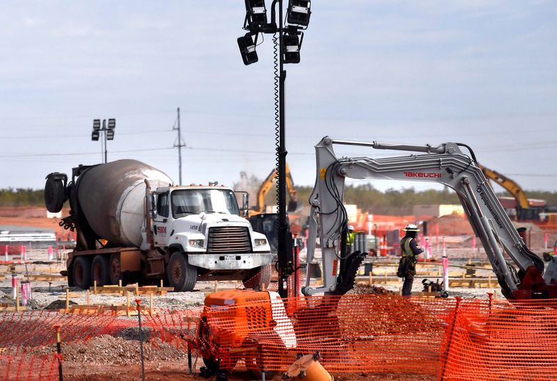Workers lay the foundation for a building at the Stargate data center construction site Sept. 23, 2025, in Abilene. Wichita Falls is expected to have an influx of workers to build data centers.