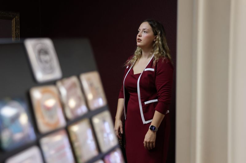 Local author and owner of Lit Brews, Elizabeth Roberts, stands in a reading space as she prepares for the coffee shop/bookstore opening on Sep. 24, 2025 in Lubbock, Texas. Lit Brews is set to officially open on Oct. 4, 2025.