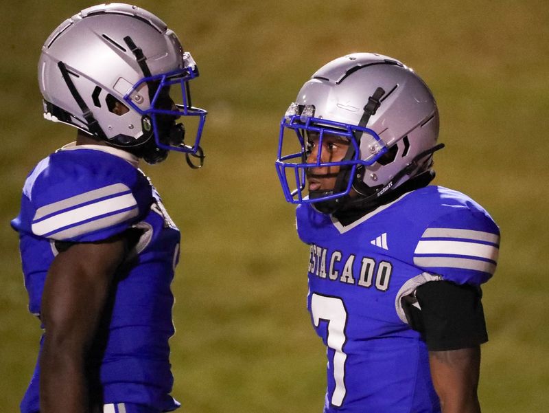 Estacado's James Boezeman celebrates his touchdown with Cedric Ross during a non-district football game, Thursday, Sept. 25, 2025, at Lowrey Field.