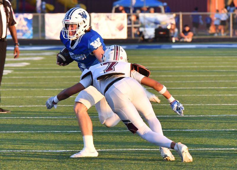 Seymour's James Betts dives for Windthorst's Brock Belcher during a game on Friday, Sep. 26, 2025 at Windthorst.