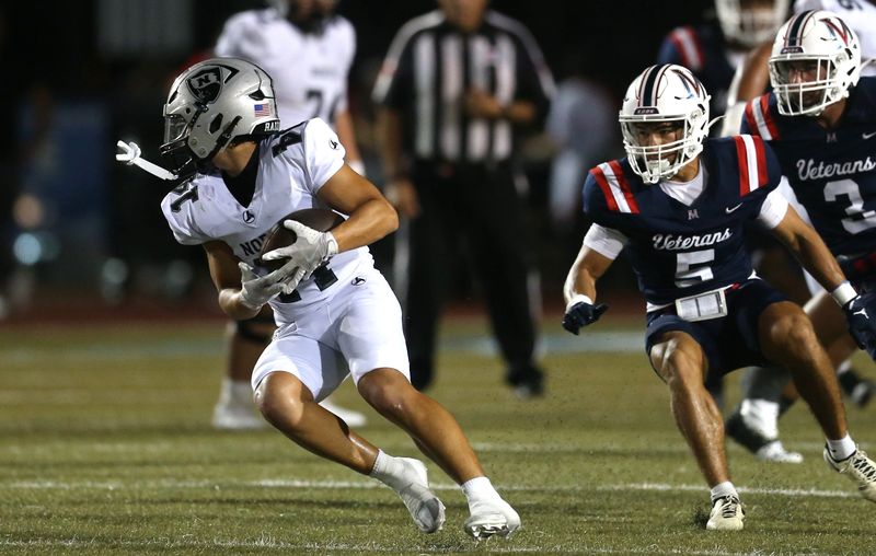 PSJA North's Antwon Estrada reverses field as he is chased by Veterans Memorial's Ryan Carmona during a high school football game at Buc Stadium on Friday, Sept. 26, 2025.