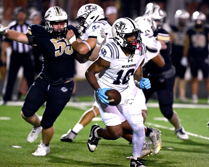 Muleshoe running back Josue Sigala looks for an opening amid the Clyde defense during Friday’s game in Clyde Sept. 26, 2025. Final score was 54-49, Clyde.