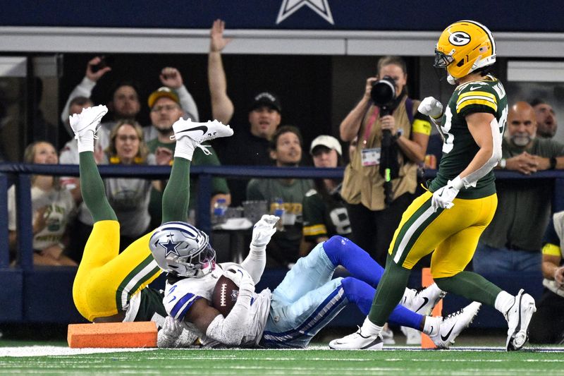 Sep 28, 2025; Arlington, Texas, USA; Dallas Cowboys wide receiver George Pickens (3) scores a touchdown against the Green Bay Packers in the fourth quarter at AT&T Stadium. Mandatory Credit: Jerome Miron-Imagn Images