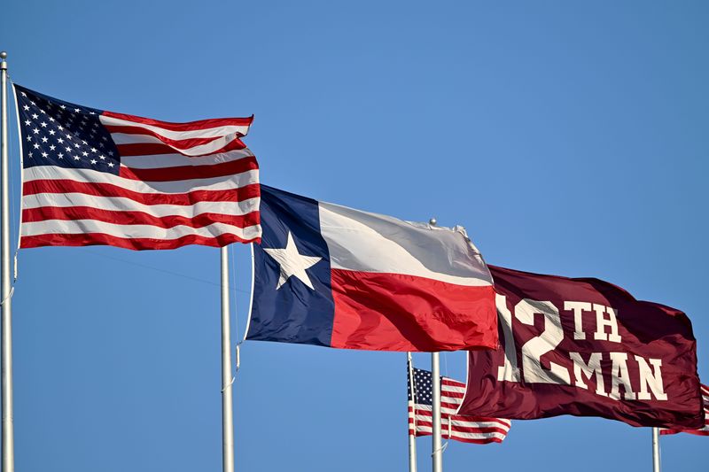 Sep 27, 2025; College Station, Texas, USA; The United States, Texas, and the 12th Man flag fly during the game between the Texas A&M Aggies and the Auburn Tigers at Kyle Field. Mandatory Credit: Maria Lysaker-Imagn Images