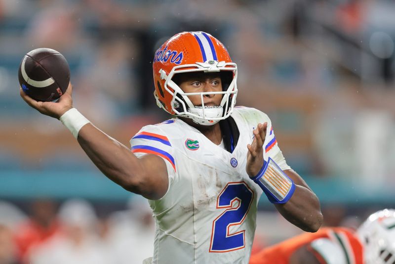 Sep 20, 2025; Miami Gardens, Florida, USA; Florida Gators quarterback DJ Lagway (2) passes the football against the Miami Hurricanes during the second quarter at Hard Rock Stadium. Mandatory Credit: Sam Navarro-Imagn Images