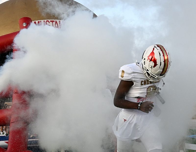 Coronado's Isaiah Doss runs onto the field before the District 2-5A Division I football game against Monterey, Friday, Oct. 3, 2025, at Lowrey Field.