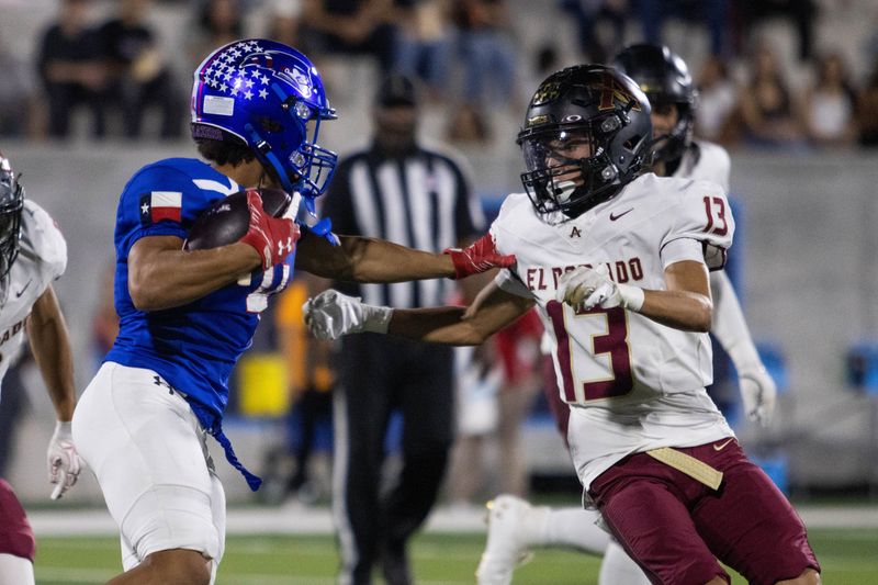 Americas High School's Maurice Edwards (4) stiff arms El Dorado High School's Andrew Estrada (13) during a high school football game at SAC 2 in El Paso, Texas on Friday, Oct. 3, 2025.