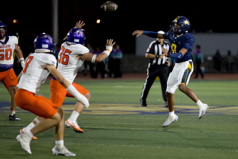 Eastwood’s Kingston Jeffries (8) throws the ball and scores a touchdown during a football game against Eastlake at Eastwood High School in El Paso, Texas, on Friday, Oct. 3, 2025.