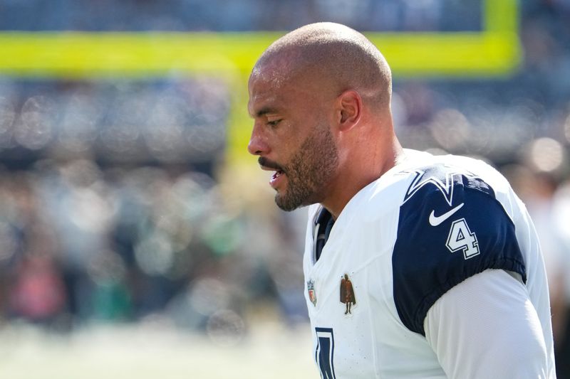 Oct 5, 2025; East Rutherford, New Jersey, USA; Dallas Cowboys quarterback Dak Prescott (4) on the field during warm ups prior to a game against the New York Jets at MetLife Stadium. Mandatory Credit: Robert Deutsch-Imagn Images