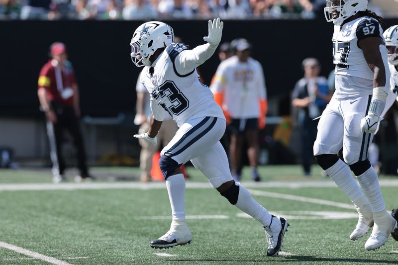 Oct 5, 2025; East Rutherford, New Jersey, USA; Dallas Cowboys defensive end James Houston (53) reacts after a sack against the New York Jets during the first half at MetLife Stadium. Mandatory Credit: Vincent Carchietta-Imagn Images