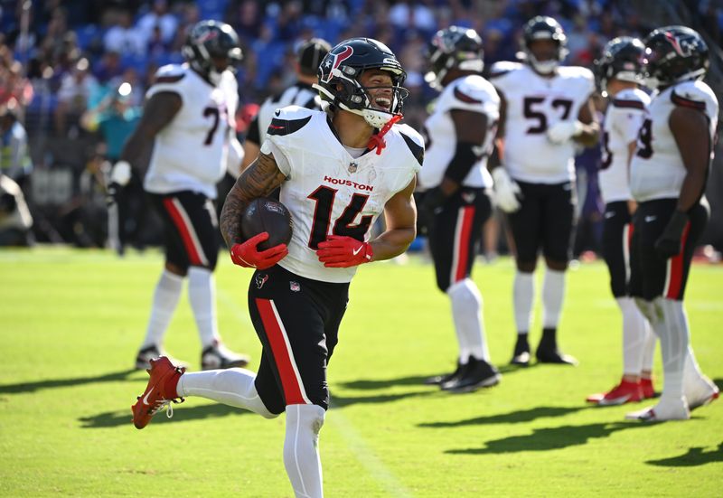 Oct 5, 2025; Baltimore, Maryland, USA; Houston Texans wide receiver Jaylin Noel (14) reacts after scoring their first career touchdown during the fourth quarter against the Baltimore Ravens at M&T Bank Stadium. Mandatory Credit: Rafael Suanes-Imagn Images