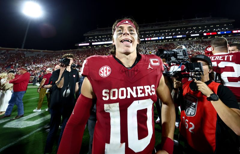 Sep 6, 2025; Norman, Oklahoma, USA; Oklahoma Sooners quarterback John Mateer (10) reacts after the game against the Michigan Wolverines at Gaylord Family-Oklahoma Memorial Stadium. Mandatory Credit: Kevin Jairaj-Imagn Images