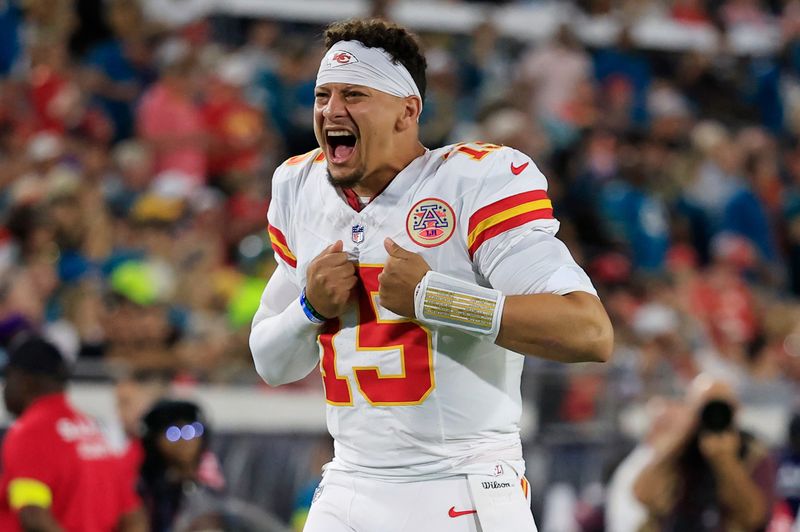 Kansas City Chiefs quarterback Patrick Mahomes (15) gets the crowd hyped before an NFL football matchup at EverBank Stadium, Monday, Oct. 6, 2025, in Jacksonville, Fla. The Jacksonville Jaguars edged the Kansas City Chiefs 31-28.