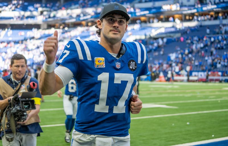 Indianapolis Colts quarterback Daniel Jones (17) makes his way off the field Sunday, Oct. 12, 2025, after a 31-27 win over the Arizona Cardinals at Lucas Oil Stadium.