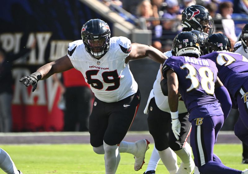 Oct 5, 2025; Baltimore, Maryland, USA; Houston Texans guard Ed Ingram (69) during play against Baltimore Ravens cornerback Keyon Martin (38) during the second quarter at M&T Bank Stadium. Mandatory Credit: Rafael Suanes-Imagn Images
