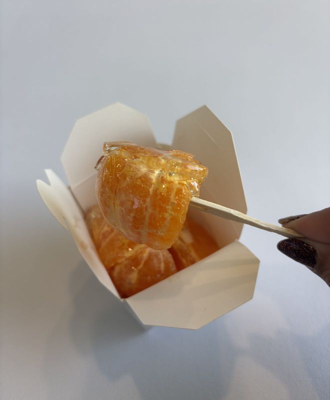 Crunch & Chill, a new shop of Asian sweets, offers Tanghulu, fruit with a hardened sugar syrup, including mandarin oranges, grapes and strawberries.