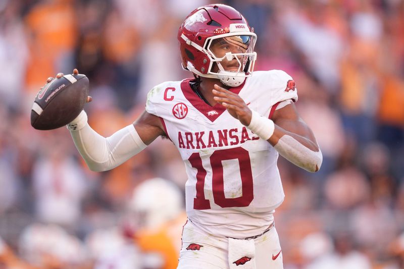 Arkansas quarterback Taylen Green (10) pulls back for the throw during an NCAA college football game against Tennessee on Oct. 11, 2025, in Knoxville, Tennessee.