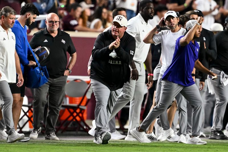 Oct 11, 2025; College Station, Texas, USA; Texas A&M Aggies head coach Mike Elko reacts after the win over the Florida Gators at Kyle Field. Mandatory Credit: Maria Lysaker-Imagn Images