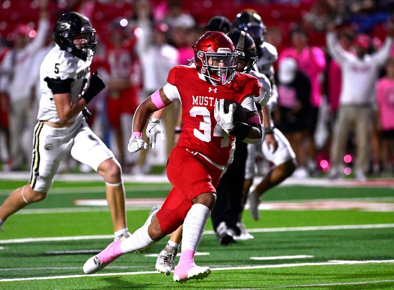 Sweetwater running back Alijah Iriarte runs through a hole in the Comanche defense to sprint for a touchdown during Friday’s game at the Mustang Bowl Oct. 17, 2025. Final score was 55-14, Sweetwater.