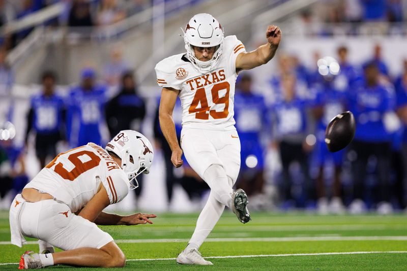 Oct 18, 2025; Lexington, Kentucky, USA; Texas Longhorns kicker Mason Shipley (49) kicks a field goal during the fourth quarter against the Kentucky Wildcats at Kroger Field. Mandatory Credit: Jordan Prather-Imagn Images
