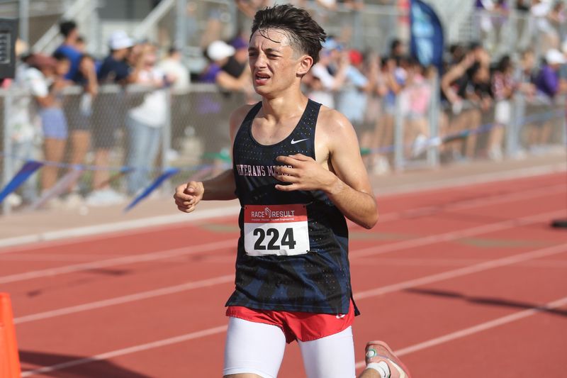 Veterans Memorial's Trey Llanes crosses the finish line in the Class 5A boys race at the UIL Region IV cross country championships at Texas A&M-Corpus Christi's Dugan Stadium on Monday, Oct. 20, 2025.