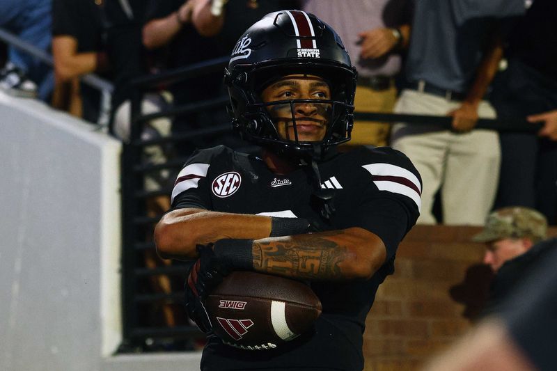 Sep 6, 2025; Starkville, Mississippi, USA; Mississippi State Bulldogs wide receiver Brenen Thompson (0) reacts after a touchdown during the second quarter against the Arizona State Sun Devils at Davis Wade Stadium at Scott Field. Mandatory Credit: Petre Thomas-Imagn Images