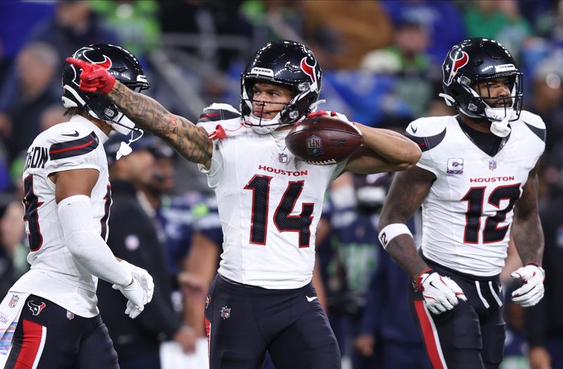 Oct 20, 2025; Seattle, Washington, USA; Houston Texans wide receiver Jaylin Noel (14) celebrates after a catch during the second quarter against the Seattle Seahawks at Lumen Field. Mandatory Credit: Kevin Ng-Imagn Images
