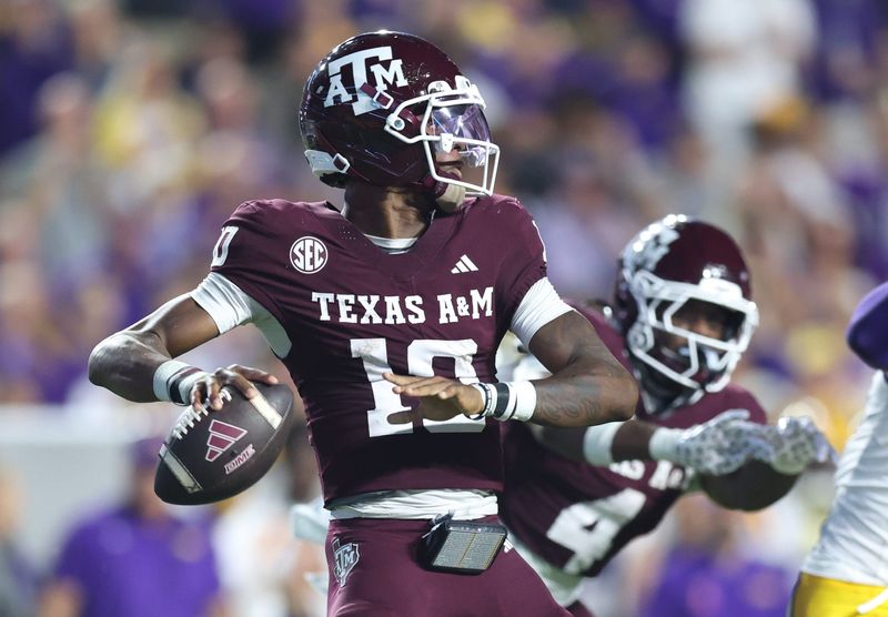Texas A&M Aggies quarterback Marcel Reed (10) drops to throw during the first half against the Louisiana State Tigers at Tiger Stadium.