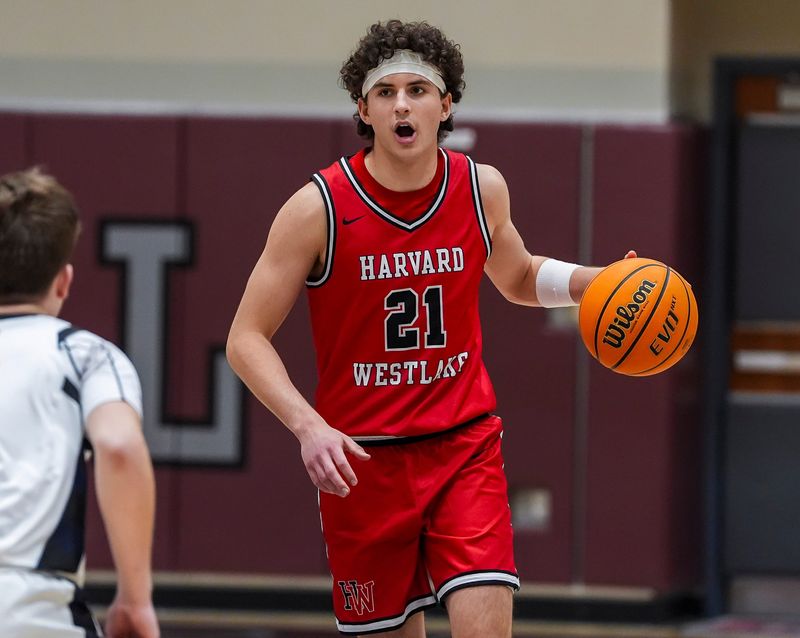 Harvard-Westlake's Joe Sterling takes the ball down the court during the first quarter of their game in the Desert Holiday Classic in Rancho Mirage, Calif., Thursday, Dec. 26, 2024.