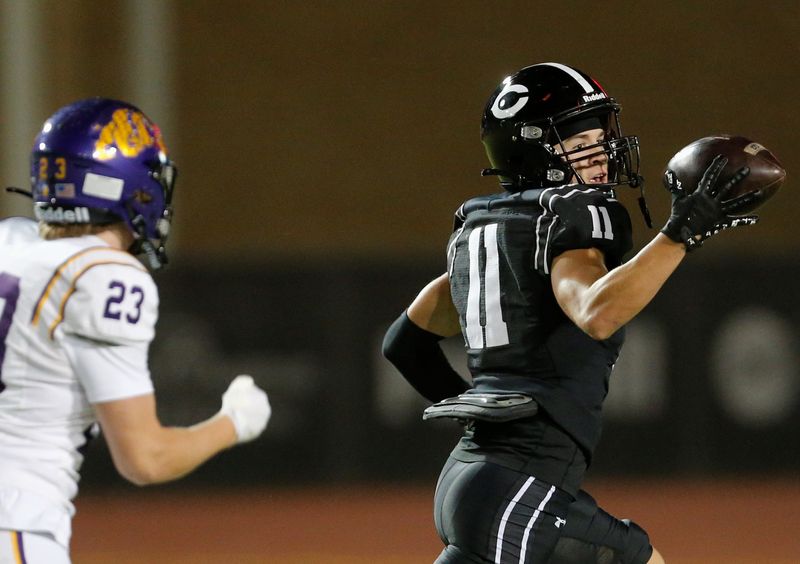 Lubbock-Cooper's Cade Gant makes a catch against Abilene Wylie in a District 2-5A Division II football game Friday, Oct. 31, 2025, at Pirate Stadium in Woodrow.