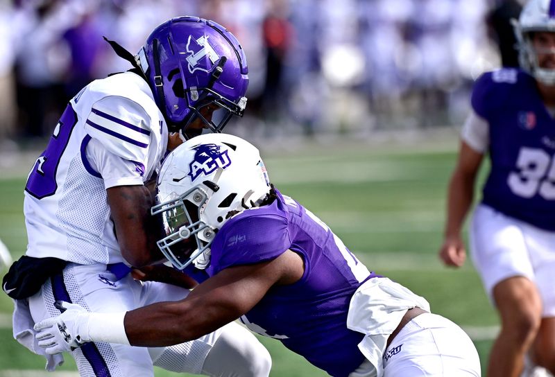 Tarleton State running back Deangelo Rosemund is tackled by ACU running back Bryce Morton during Saturday’s game in Abilene Nov. 1, 2025. Final score was 31-28, Abilene Christian University.