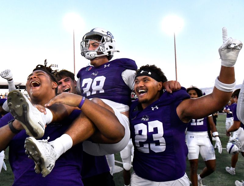 ACU kicker Brandon Perez is carried off the field by his teammates after scoring the game-winning field goal against Tarleton State during Saturday’s game in Abilene Nov. 1, 2025. Final score was 31-28, Abilene Christian University.