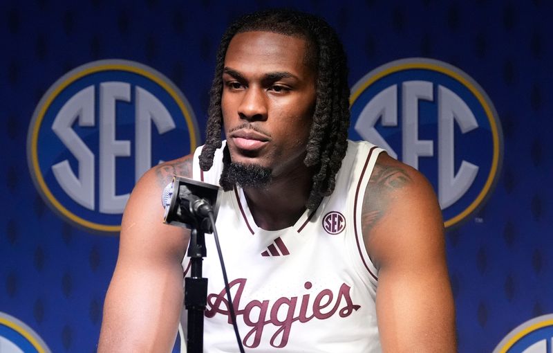 Oct 15, 2025; Birmingham, Alabama, USA; Texas A&M player Mackenzie Mgbako talks to reporters at SEC Media Day in the Grand Bohemian Hotel.